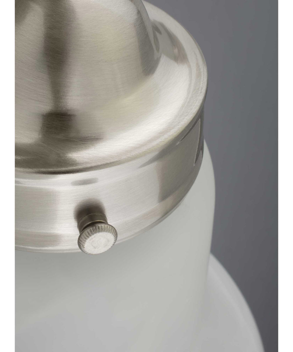 Close-up of the brushed nickel bath vanity light showcasing its elegant design and etched glass detailing.